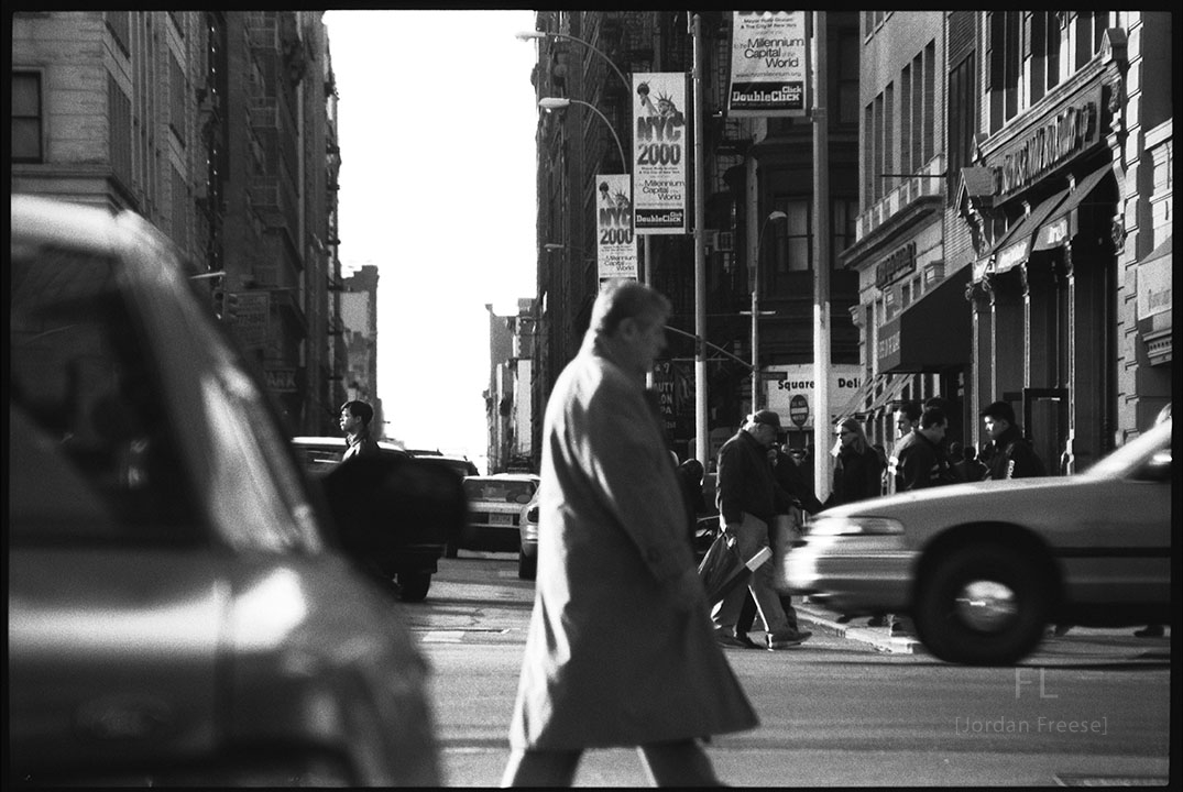 Man crossing nyc street 20240906